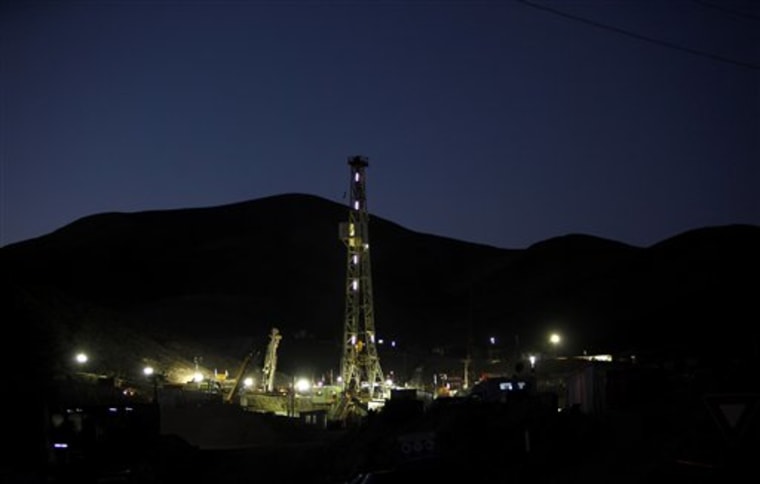 Drilling machines work at the San Jose mine to rescue 33 trapped miners in Copiapo, Chile. The miners have been trapped deep underground in the copper and gold mine since it collapsed on Aug. 5; rescuers may reach them Saturday.